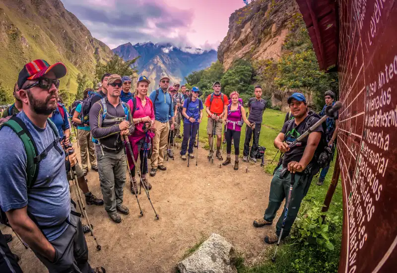 Group of hikers with a guide during the Inca Trail to Machu Picchu trek through the Peruvian Andes