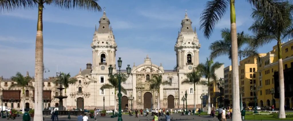 Plan Your Trip to Peru, Plaza Mayor of Lima in Peru with colonial buildings, cathedral, government palace, and historic city square in the capital