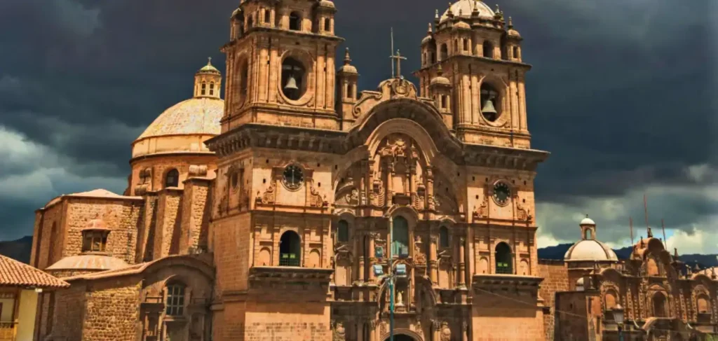 Visit Cusco 2026,Cusco city in Peru with Plaza de Armas, colonial architecture, mountains, and travelers exploring the historic center of the Inca capital