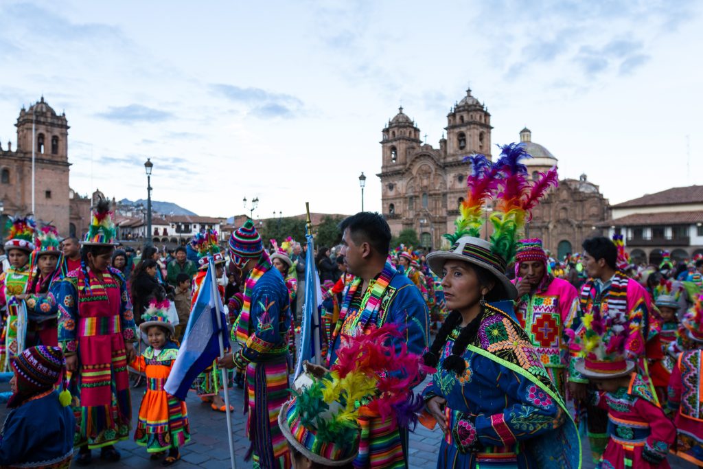 Colorful scenes from Cusco Carnival 2026 with locals celebrating, dancing, and enjoying traditional Andean festivities in Cusco, Peru.