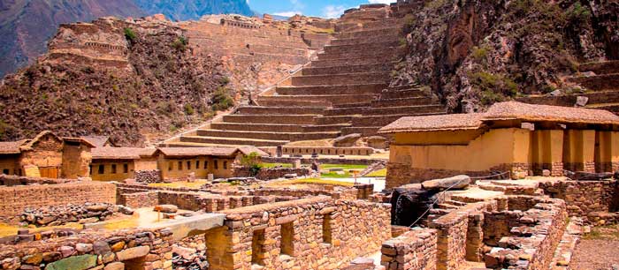 Ancient Inca ruins and stone terraces in Ollantaytambo, located in Peru’s Sacred Valley and surrounded by dramatic Andean mountains.