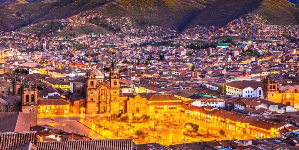 Plaza de Armas of Cusco, Peru, surrounded by colonial architecture, historic churches, and vibrant local culture, Book Now