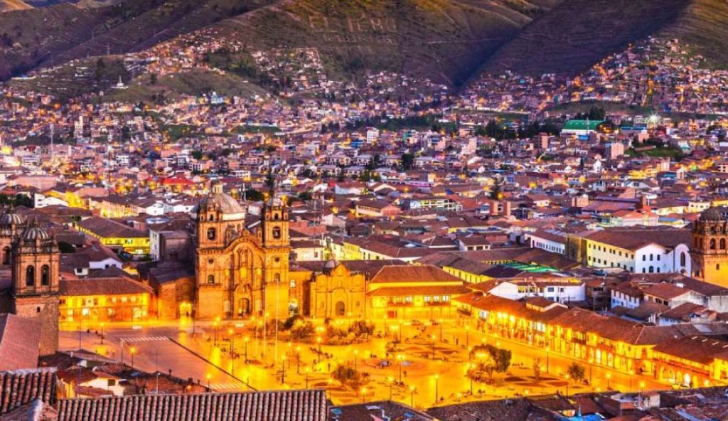 Plaza de Armas of Cusco, Peru, surrounded by colonial architecture, historic churches, and vibrant local culture, Book Now