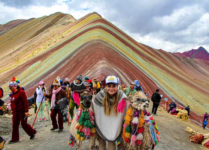 Vinicunca Mountain in Cusco Peru featuring colorful mineral layers and stunning Andean landscapes
