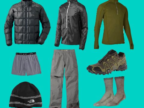 Hikers wearing proper trekking clothing in the Andes Mountains, equipped with layered outdoor gear suitable for changing weather conditions and high-altitude adventures.