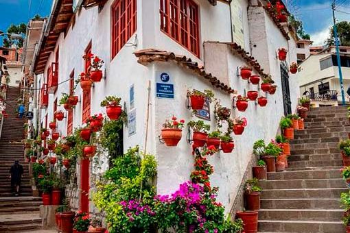 Beautiful view of Street 7 Borreguitos in Cusco with stone-paved alley, colonial architecture, and traditional Andean charm