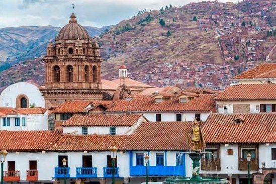 Visit Cusco 2026, Panoramic view of Cusco City, Peru, featuring historic colonial architecture, Inca heritage, vibrant plazas, and the surrounding Andes Mountains.