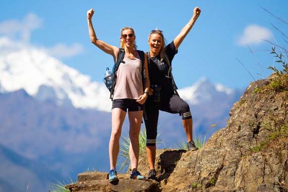Female travelers hiking and enjoying scenic mountain and jungle trails along the Inca Jungle tours, Inca Jungle Tour