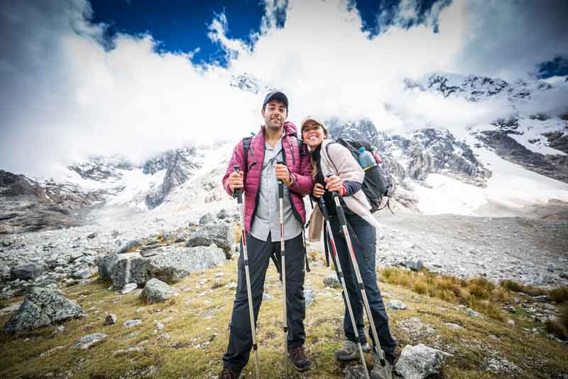 Adventure in the spectacular Salkantay route, Salkantay Trek in Peru showing snow-capped Salkantay Mountain, high Andean trails, lakes, and hikers on the route to Machu Picchu